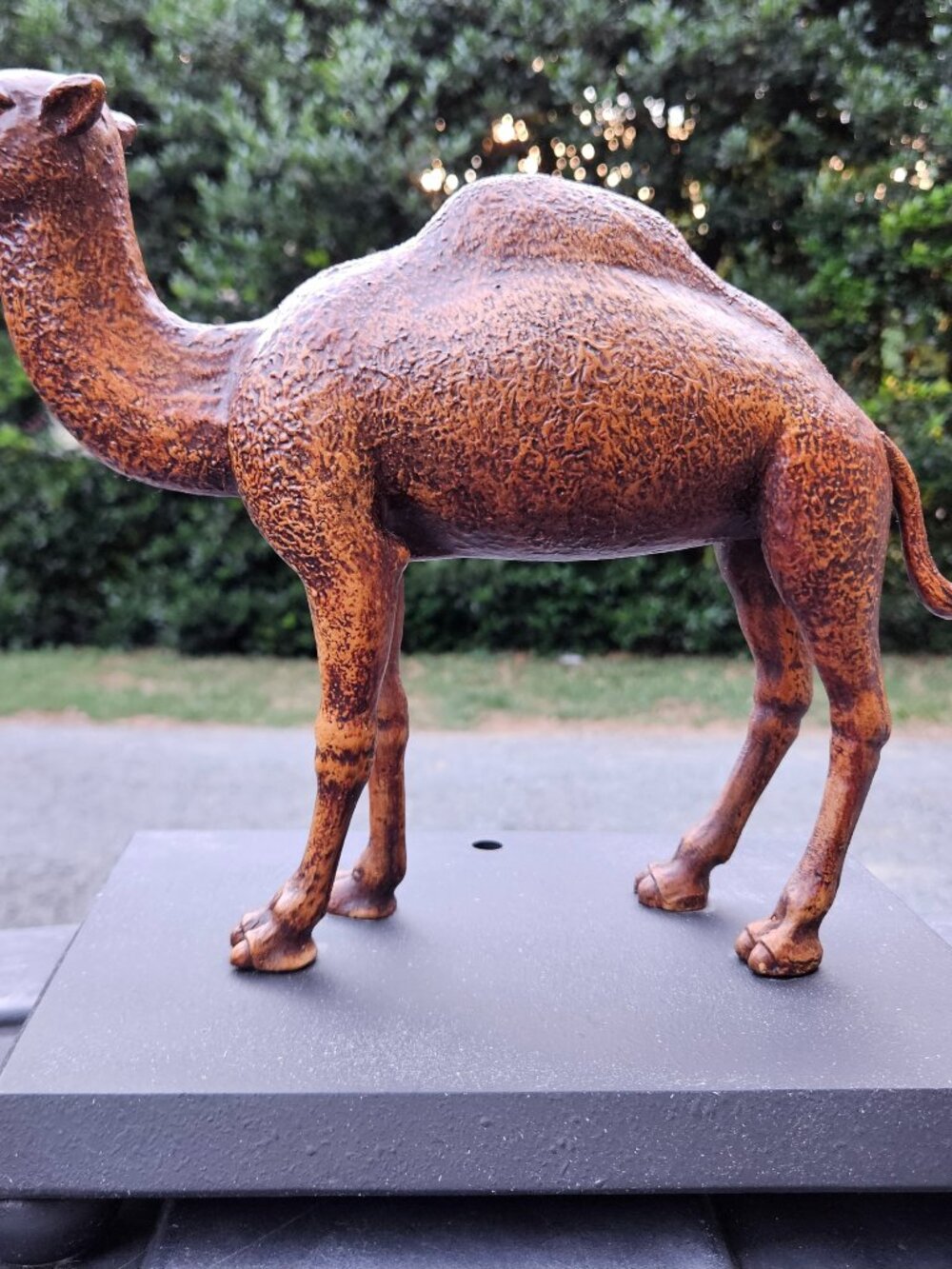 Camel Statue. Used to be part of a lamp. Heavy piece with black base
